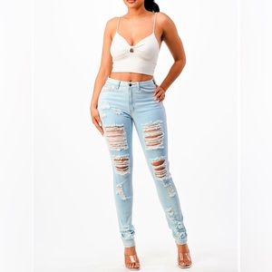 HIGH RISE DISTRESSED JEANS LIGHT BLUE